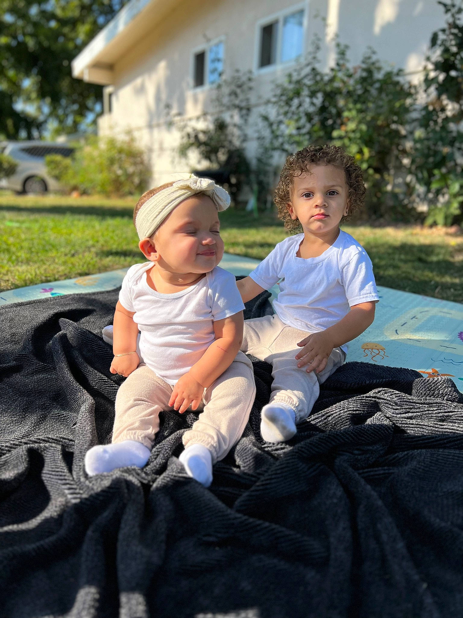 Alontae joined the competition — help win amazing prizes! child, event, face, fun, grass, happy, headwear, landscape, lawn, leisure, luxury_vehicle, person, plant, play, recreation, shorts, sitting, soil, t_shirt, toddler