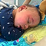 Kaiden joined the competition — help win amazing prizes! baby, sleeping, pacifier, blanket, plush_toy, quilt, infant, face, peaceful, closeup, child, blue_clothing, soft, indoors, cute, resting, head, nap, comfort, young