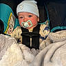 baby, beanie, blanket, blue, buckle, car_seat, child, closeup, cozy, cute, eyes, hood, infant, pacifier, plush, portrait, rosy_cheeks, safety_strap, seat_label, sleepwear