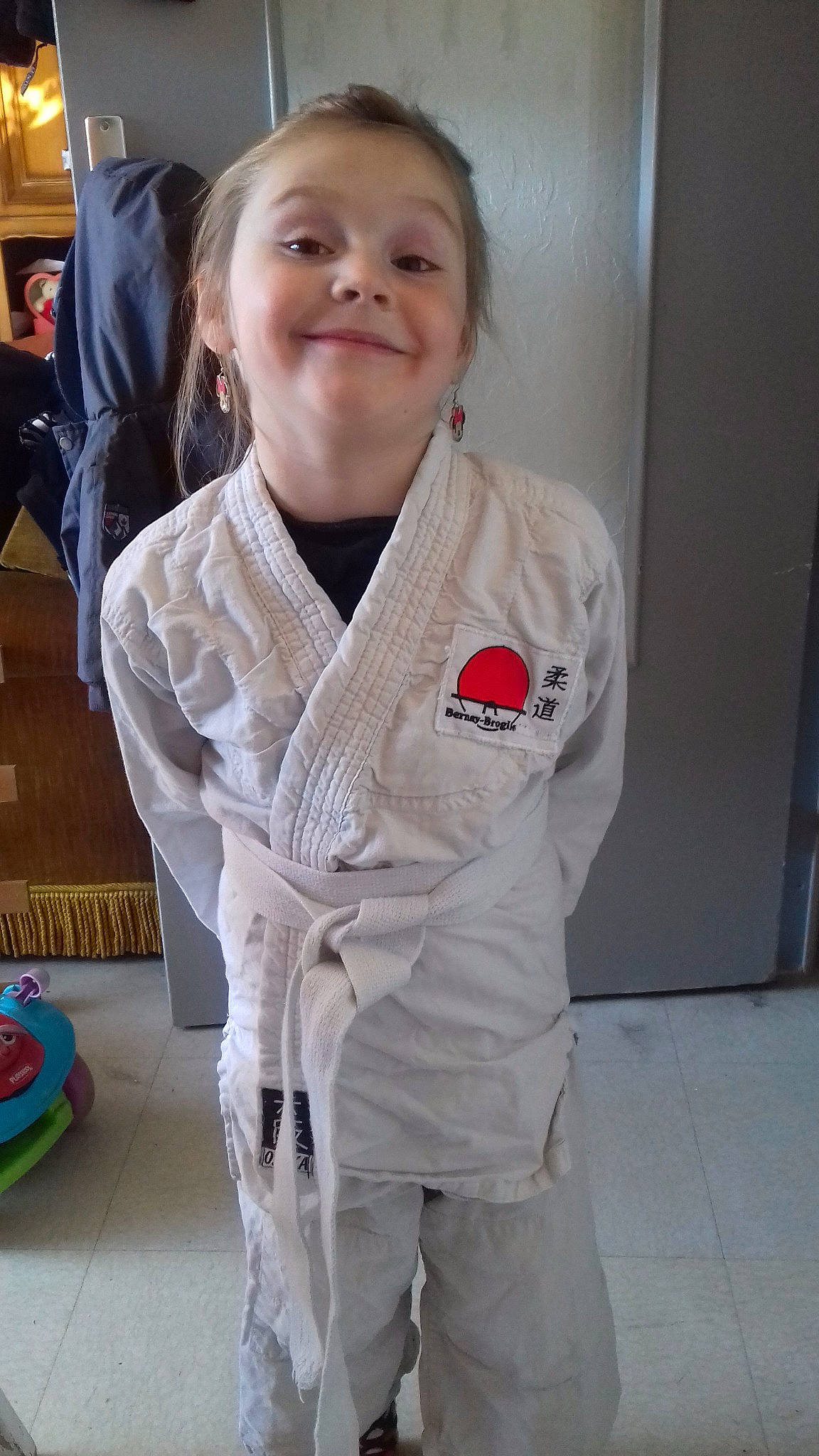 Naelle a rejoint le concours — aidez-le/la à gagner de superbes lots ! arm, child, choi_kwang_do, contact_sport, dobok, hapkido, individual_sports, japanese_martial_arts, judo, jujutsu, karate, martial_arts, martial_arts_uniform, person, smile, taekwondo