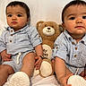 baby, twin, toddler, striped_clothing, plush_toy, teddy_bear, indoor, sitting, cute, child, white_background, portrait, smiling, infant, young_child, matching_outfits, soft_toy, closeup, happy, buttoned_shirt