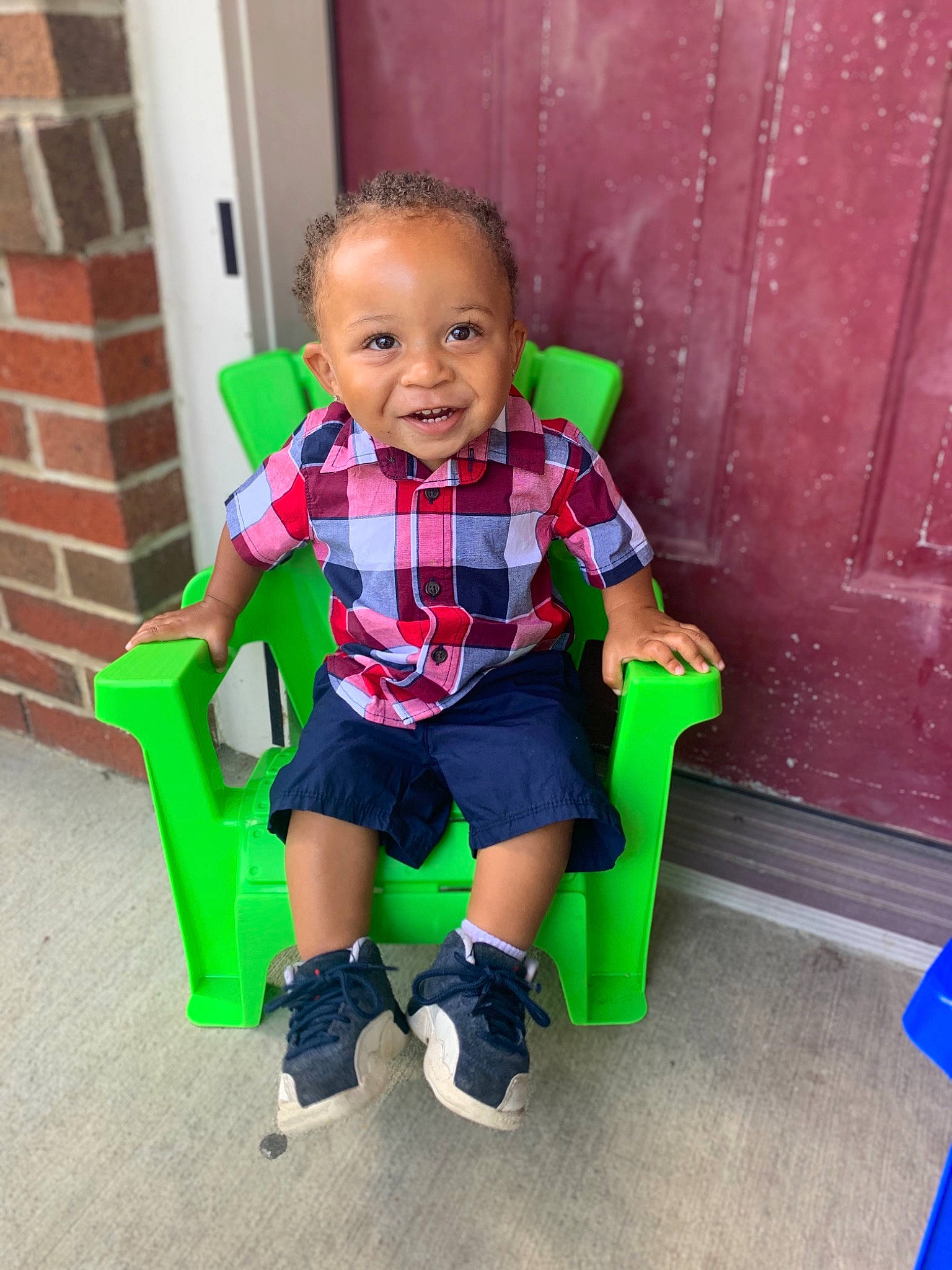 Hayden is registered to the contest to win money with this photo: baby, child, footwear, fun, green, joy, person, play, shoe, sitting, skin, smile, standing, toddler