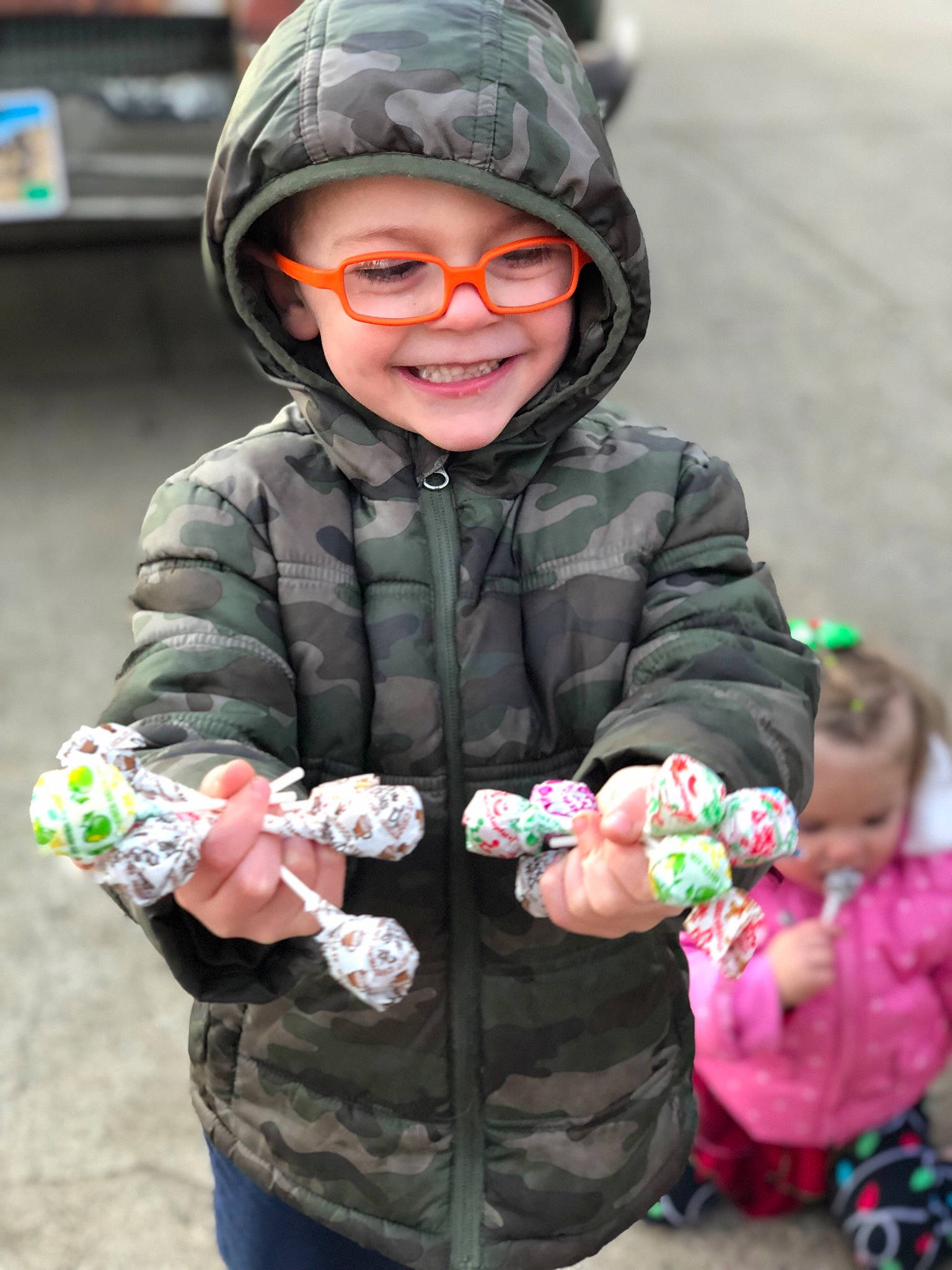 Noah is registered to the contest to win money with this photo: blurred, child, glasses, headwear, joy, person, play, smile, toddler