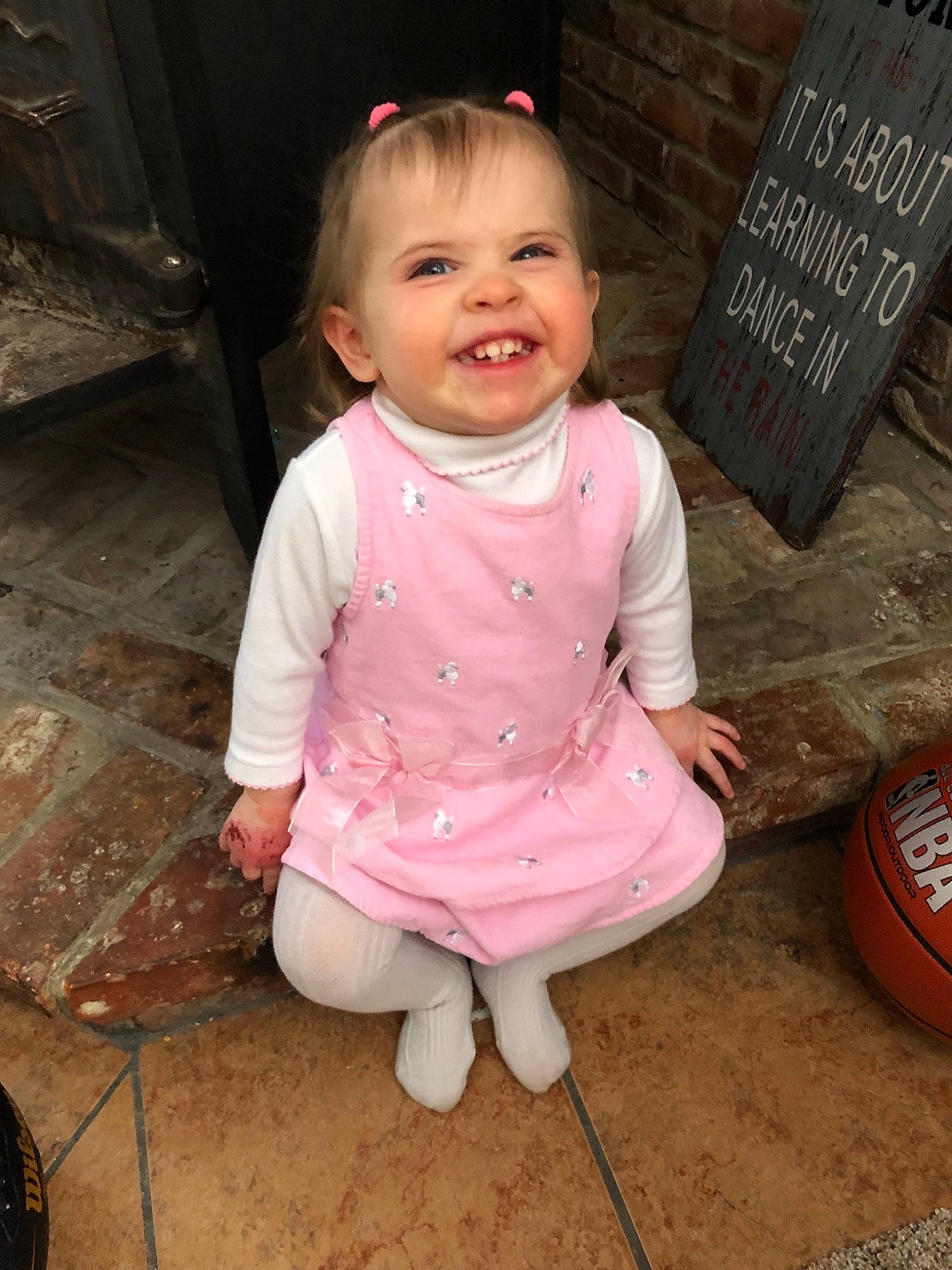 Preslee is registered to the contest to win money with this photo: baby, baby_toddler_clothing, cheek, child, face, joy, person, pink, sitting, skin, smile, toddler