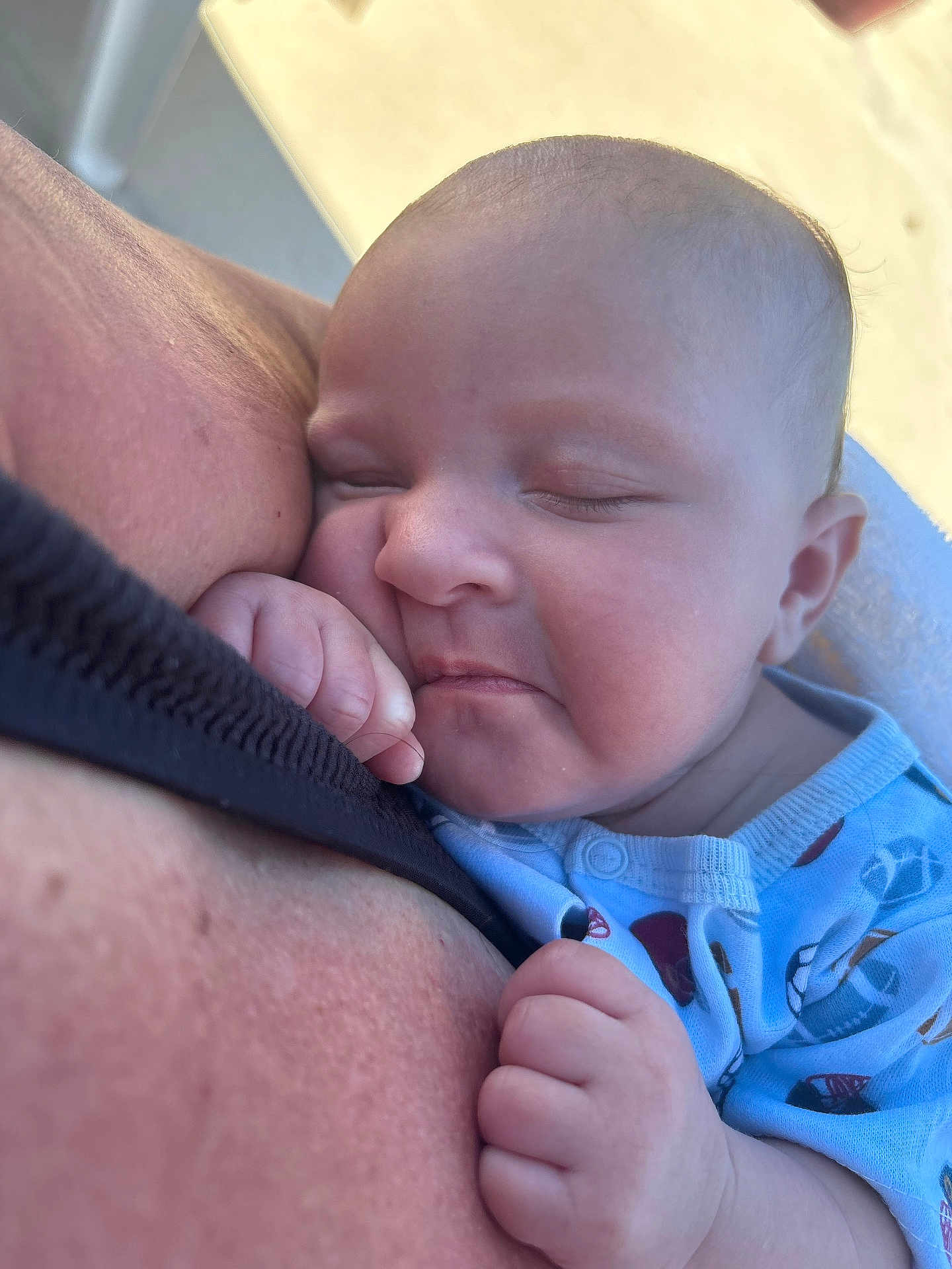 Gervonta is registered to the contest to win money with this photo: baby, sleeping, infant, closeup, skin, hand, onesie, blue_clothing, person, face, peaceful, nap, cuddle, human, child, cute, newborn, soft_light, indoor, tender