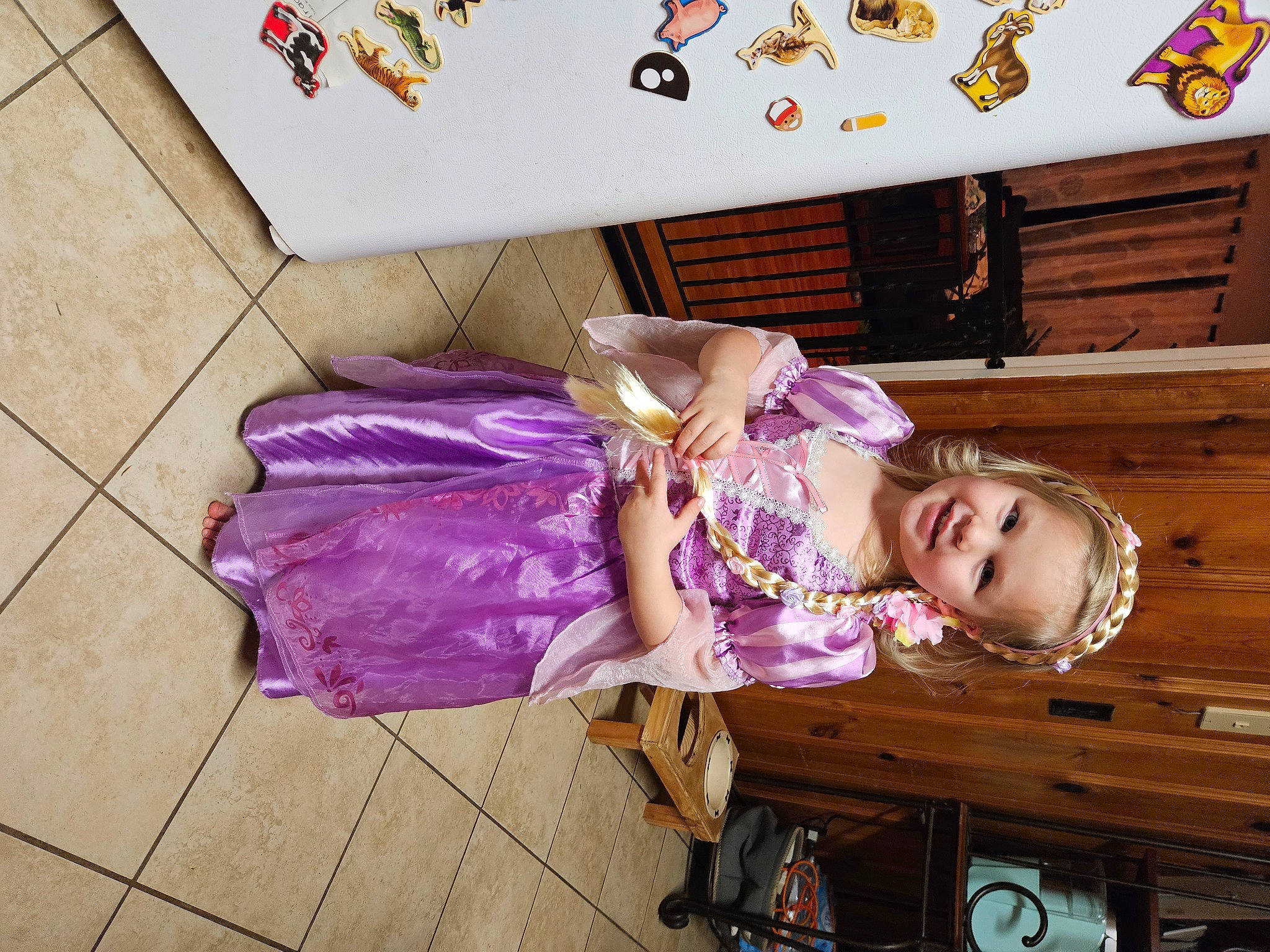 Ariya joined the competition — help win amazing prizes! baby_toddler_clothing, child, costume, flooring, fun, happy, hardwood, joy, leisure, magenta, pattern, person, pink, purple, room, smile, toddler, wood