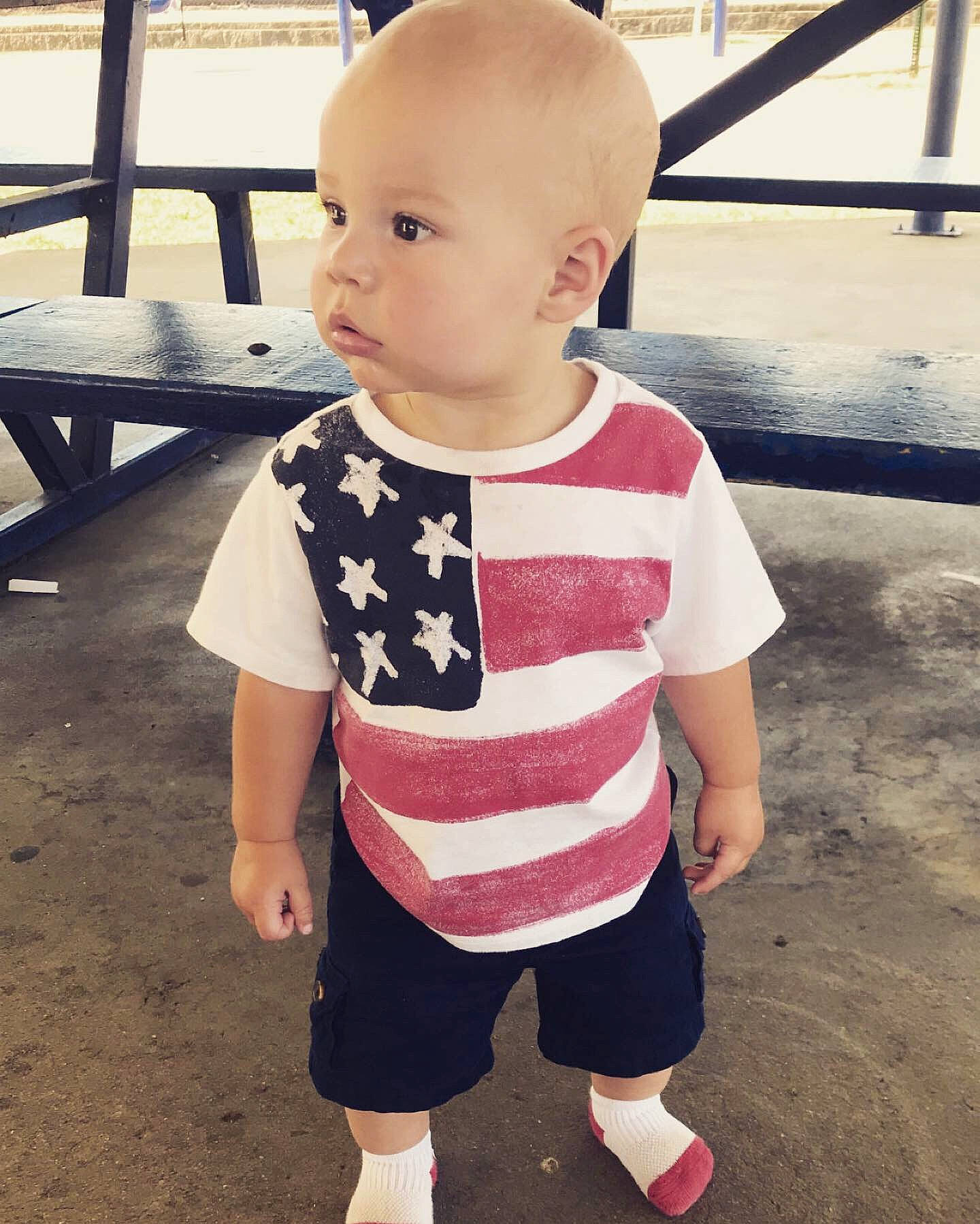 Canaan joined the competition — help win amazing prizes! baby, baby_toddler_clothing, cheek, child, clothing, cool, design, face, footwear, hairstyle, head, person, pink, product, shoe, skin, sleeve, standing, summer, t_shirt