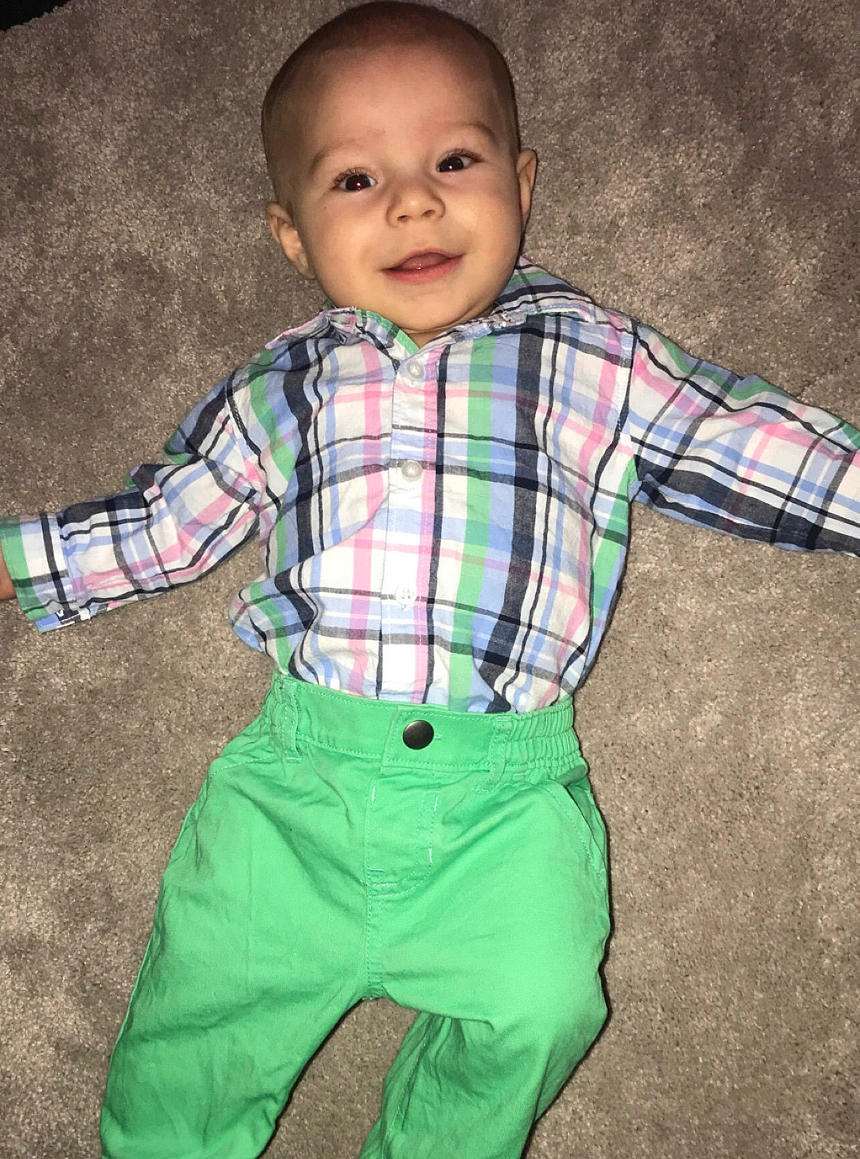 Canaan is registered to the contest to win money with this photo: baby, baby_products, baby_toddler_clothing, child, child_model, clothing, design, green, pattern, person, plaid, sleeve, smile, standing, t_shirt, tartan, toddler