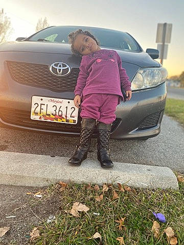 Serenity Hope joined the competition — help win amazing prizes! alloy_wheel, automotive_design, automotive_exterior, automotive_lighting, automotive_tire, bumper, car, grass, grille, hood, land_vehicle, motor_vehicle, person, personal_luxury_car, plant, rim, sky, tire, vehicle, vehicle_door