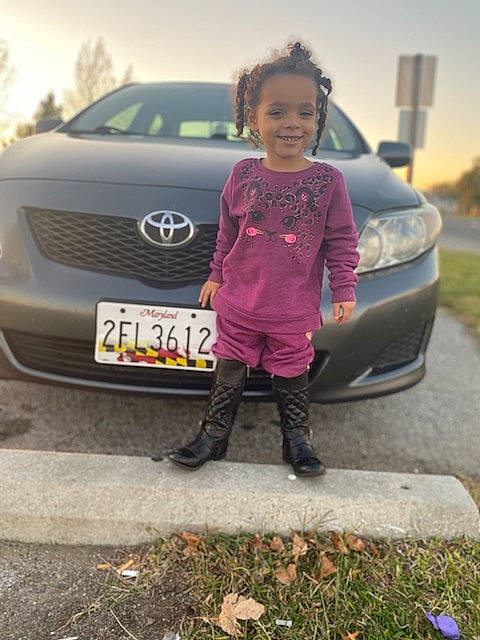 Serenity Hope is registered to the contest to win money with this photo: automotive_design, automotive_exterior, automotive_lighting, automotive_tire, bumper, car, fender, grille, headlamp, hood, joy, mode_of_transport, motor_vehicle, person, personal_luxury_car, plant, rim, sky, tire, tree