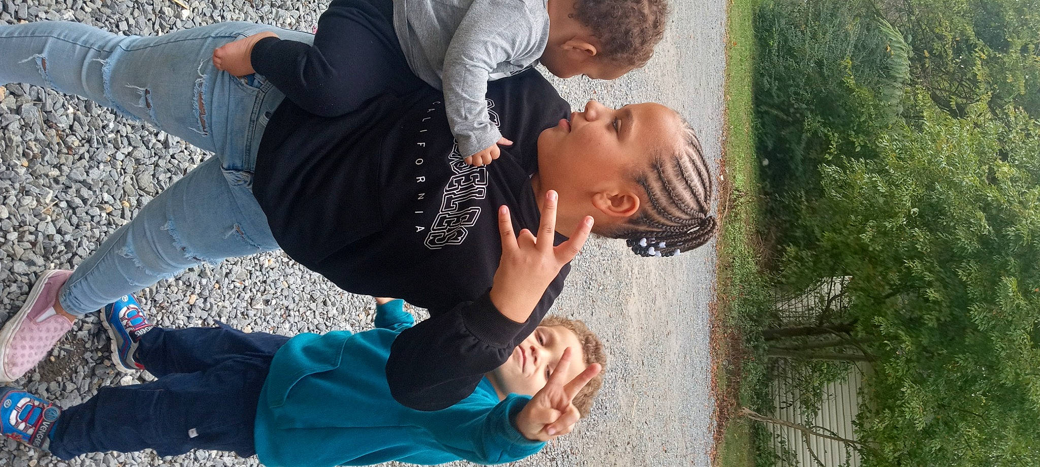 Emrieana is registered to the contest to win money with this photo: child, event, fun, gesture, grass, green, happy, leisure, people_in_nature, person, plant, play, recreation, sitting, t_shirt, toddler, tree