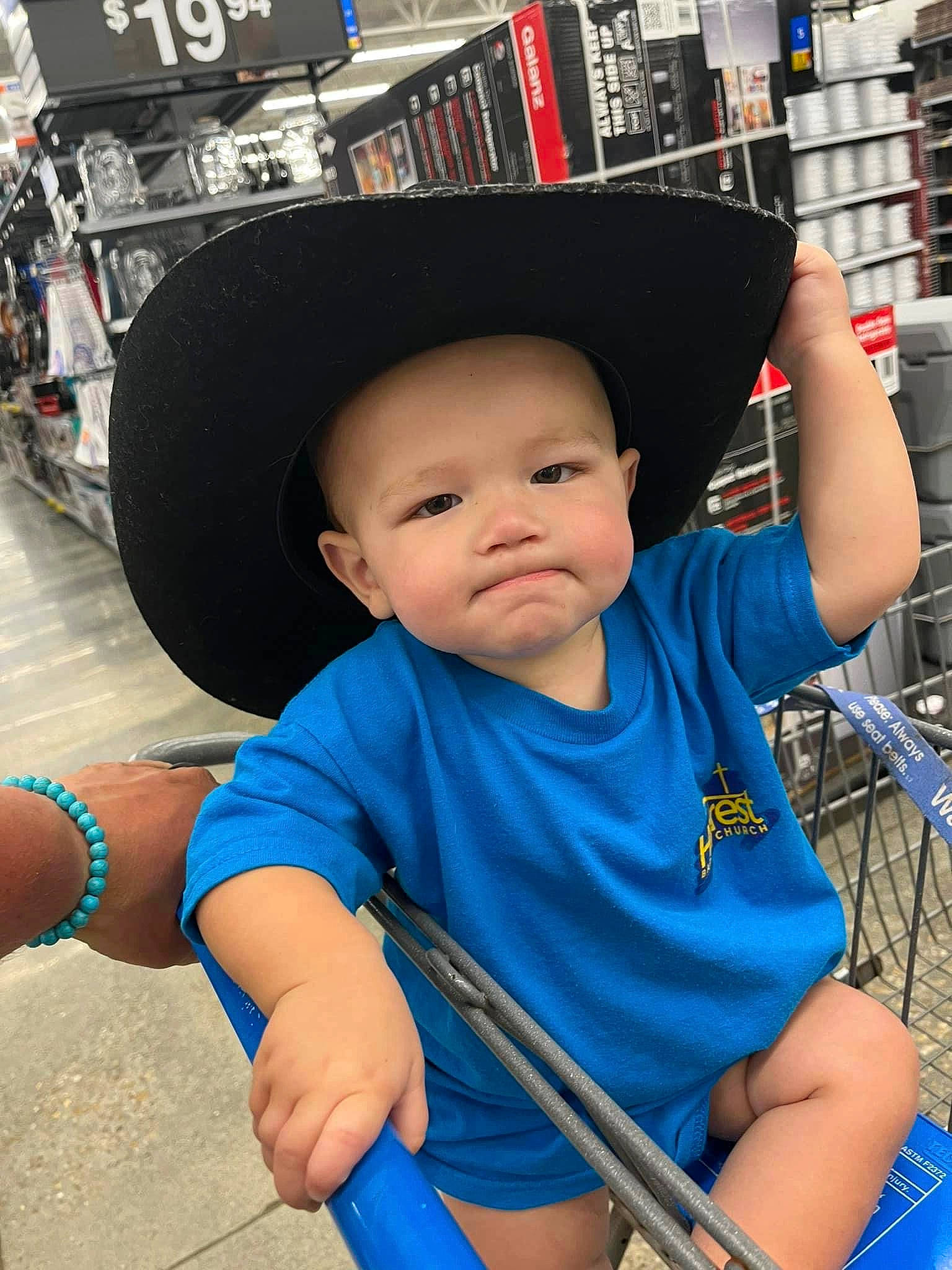Keith is registered to the contest to win money with this photo: baby, cap, chair, child, electric_blue, fun, happy, hat, leisure, outdoor_play_equipment, person, photograph, publication, shelf, shorts, sitting, smile, snapshot, t_shirt, thigh