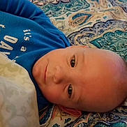 Leeland Dewayne Hurt is registered to the contest to win money with this photo: arm, bedtime, blue, boy, cheek, child, eye, face, finger, forehead, hand, head, infant, mouth, nose, person, product, skin, sleep, toddler