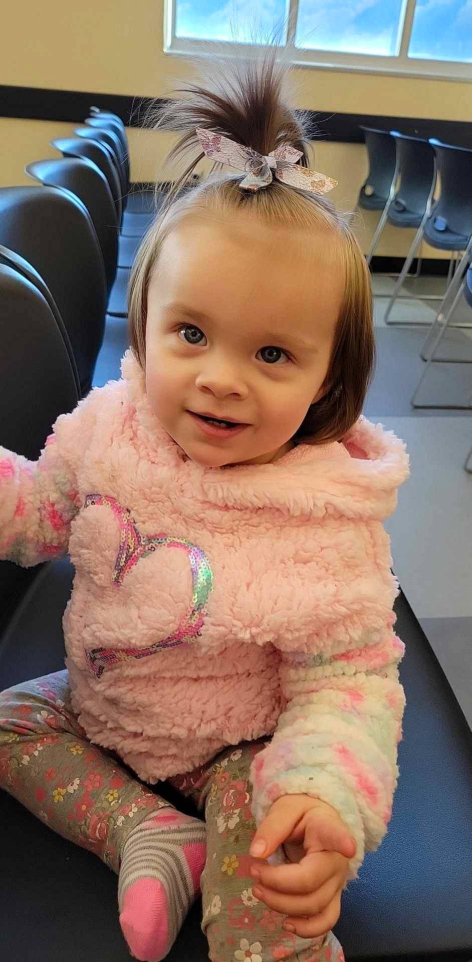 Aubriella is registered to the contest to win money with this photo: baby, baby_toddler_clothing, chair, cheek, child, chin, eye, eyebrow, eyelash, fashion_accessory, fun, hairstyle, happy, iris, lip, person, pink, skin, sleeve, smile