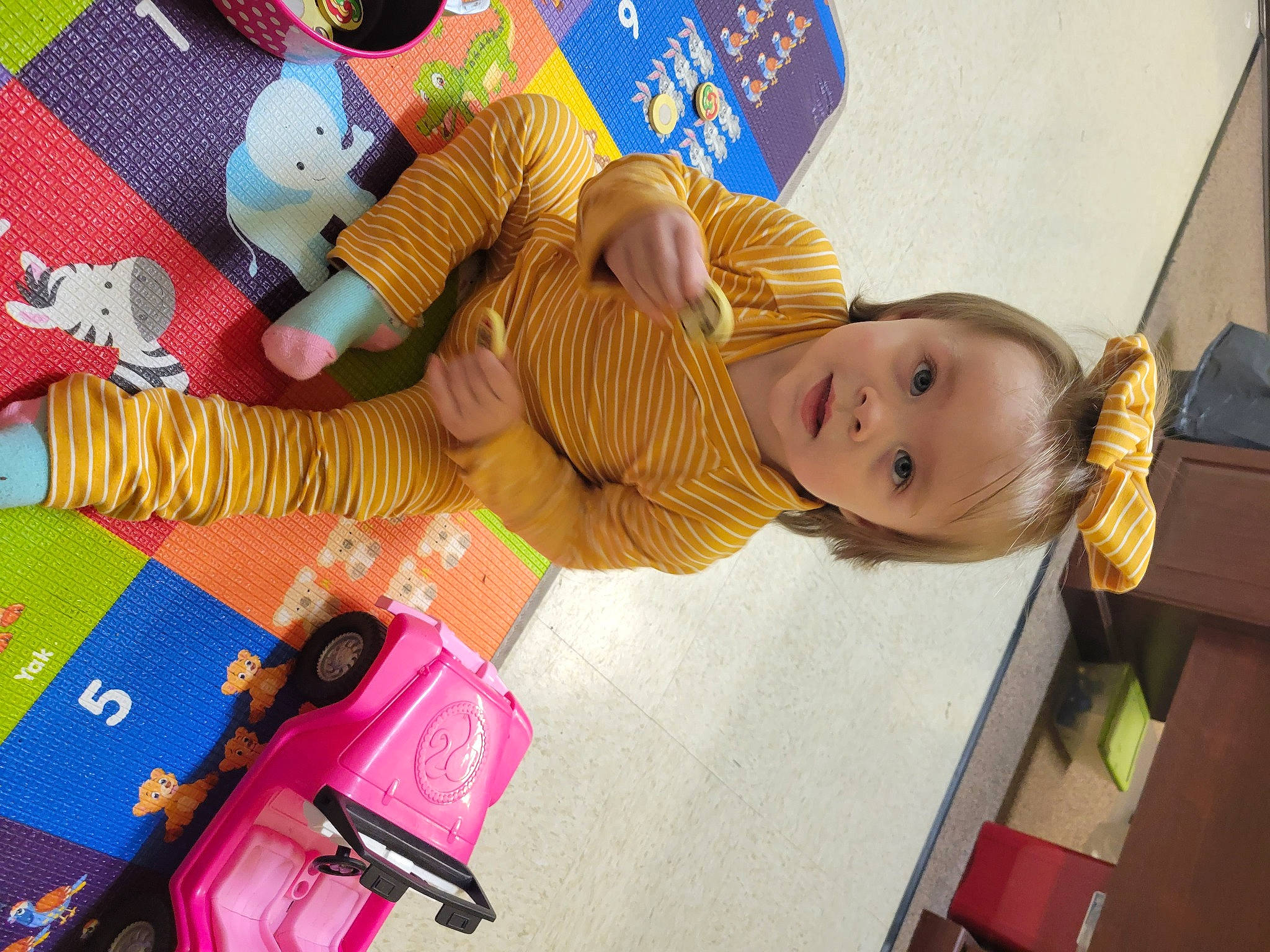 Aubriella joined the competition — help win amazing prizes! art, baby, baby_products, baby_toys, child, fun, magenta, person, play, room, stuffed_toy, toddler, toy, toy_vehicle, wood, wool