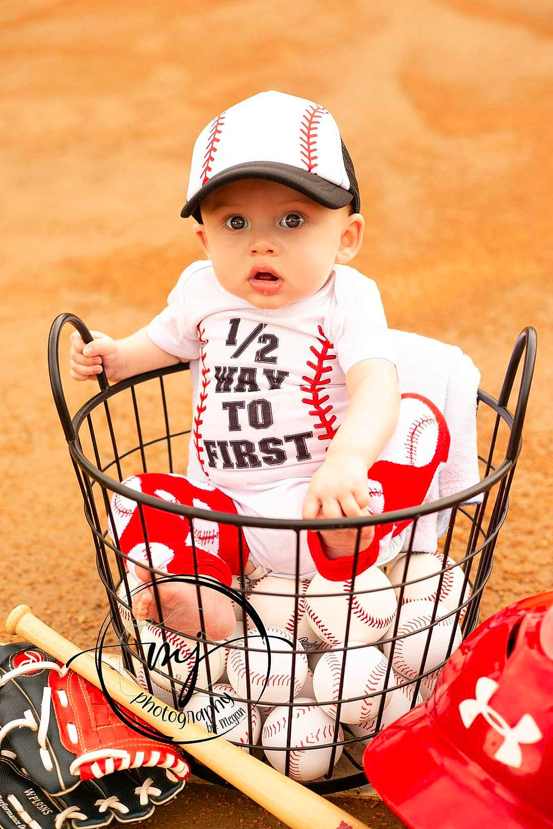 Kaiser is registered to the contest to win money with this photo: baby, baby_toddler_clothing, baseball_cap, cap, carmine, child, fashion_accessory, fun, happy, hat, headwear, human_leg, mammal, person, product, red, shopping_cart, sitting, surprise, thigh