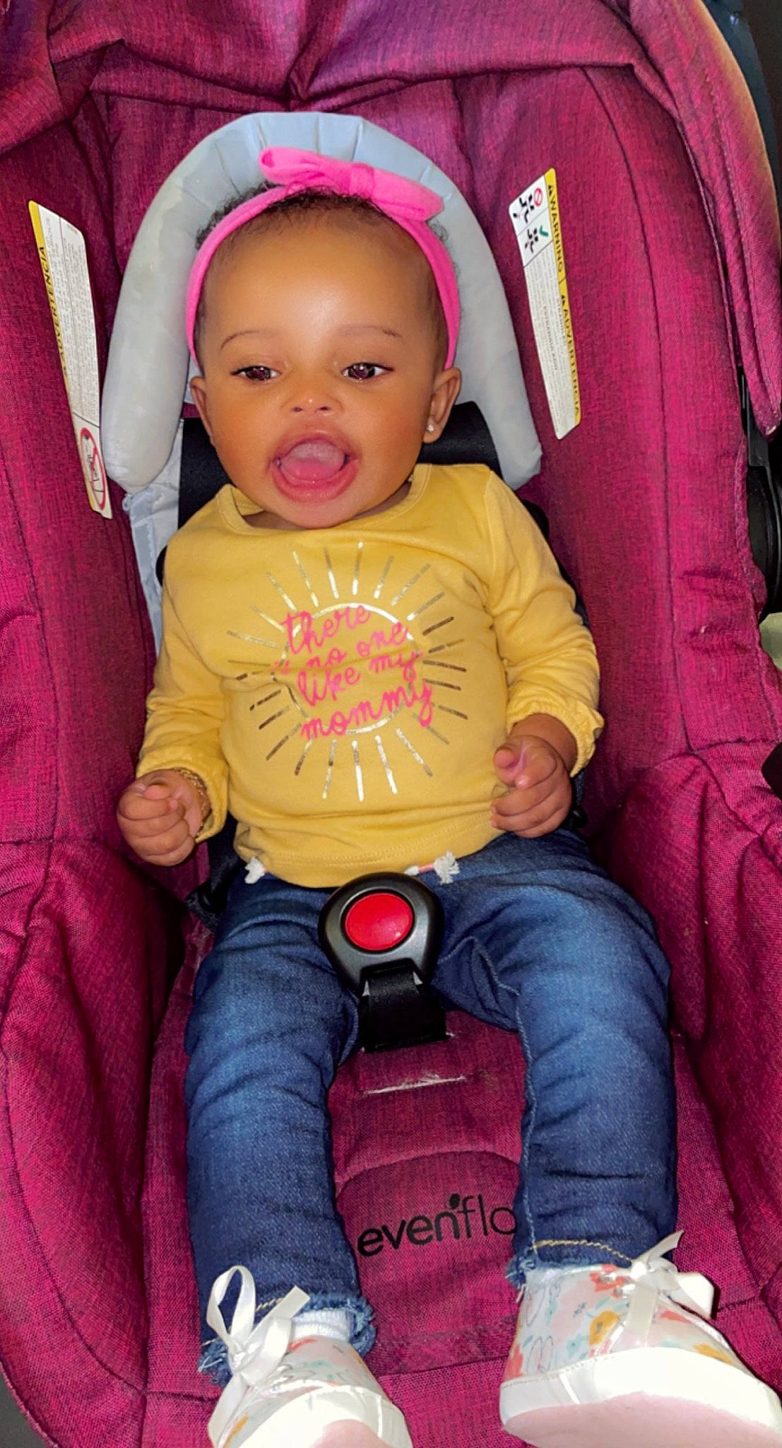 Cami is registered to the contest to win money with this photo: baby, baby_toddler_clothing, cheek, child, comfort, cool, eye, facial_expression, happy, head, jeans, lap, person, pink, product, red, skin, sleeve, smile, toddler