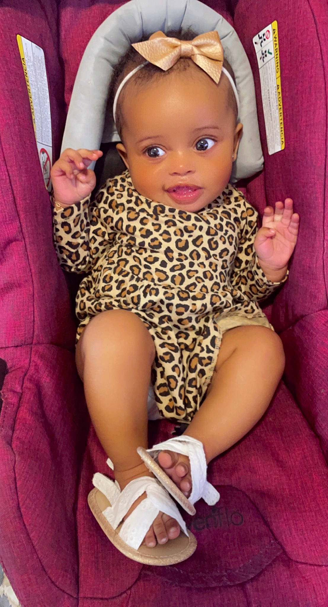 Cami is registered to the contest to win money with this photo: baby, baby_toddler_clothing, blond, brown_hair, cheek, comfort, eye, fashion_accessory, hairstyle, human_leg, magenta, nail, pattern, person, pink, purple, skin, thigh, thumb, toddler