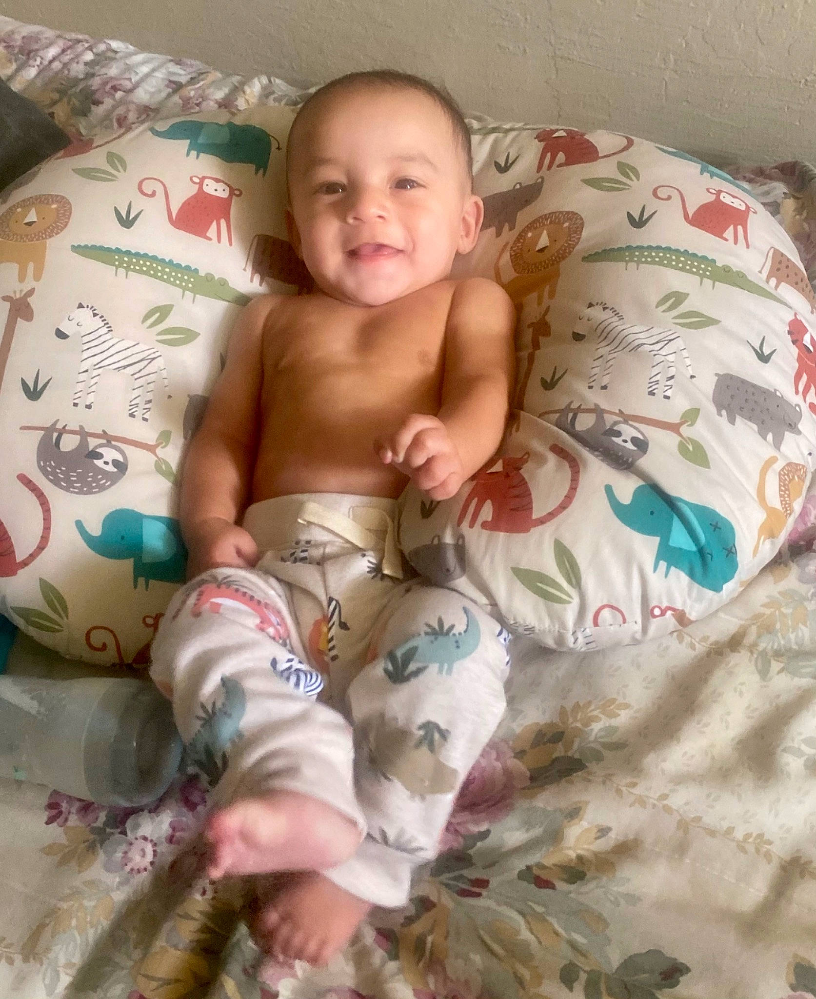 Gideon is registered to the contest to win money with this photo: abdomen, arm, baby, cheek, chest, child, comfort, eye, face, finger, hand, head, human_body, joy, leg, person, skin, smile, stomach, textile