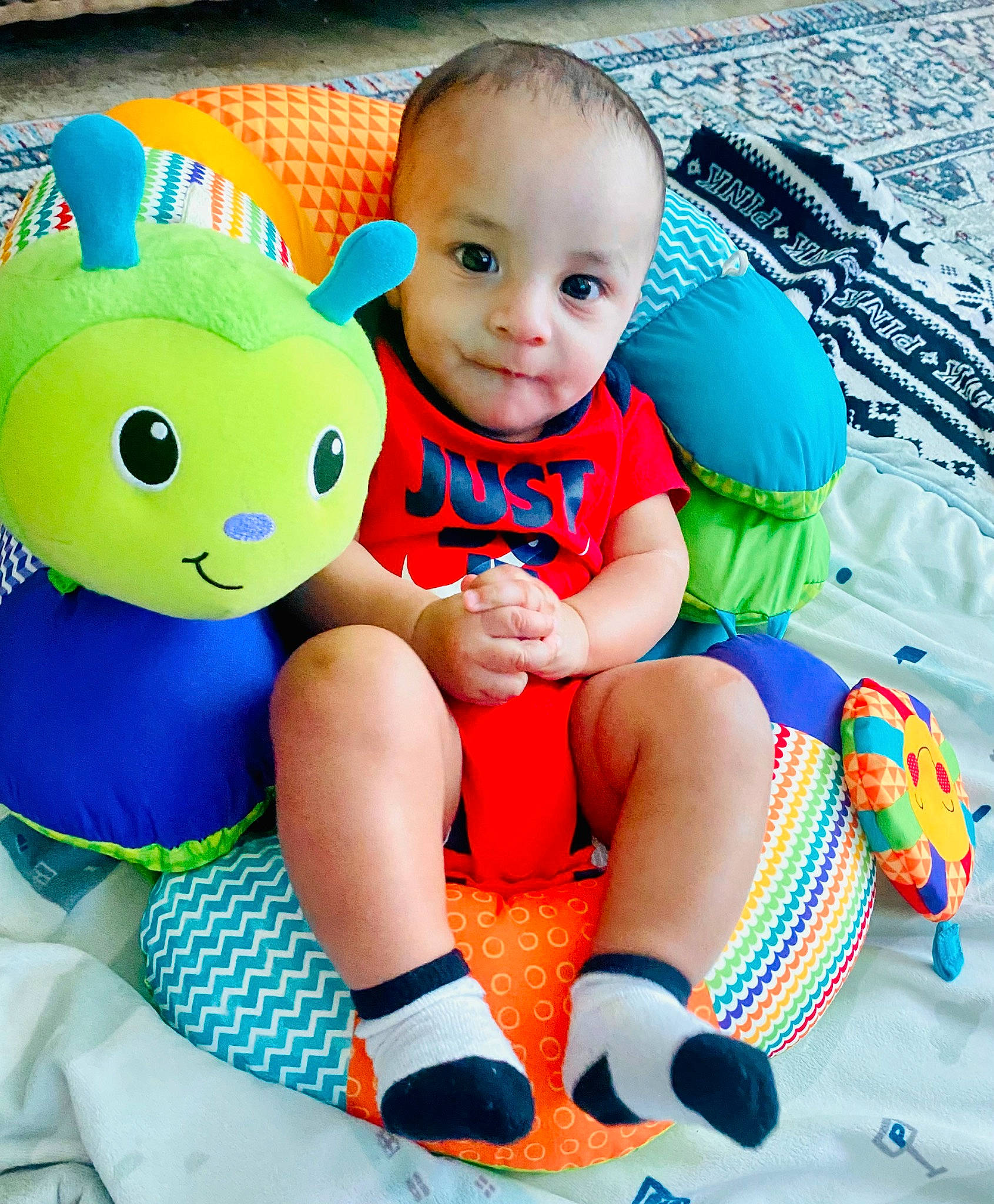 Gideon joined the competition — help win amazing prizes! aqua, arm, azure, baby_playing_with_toys, baby_toddler_clothing, blue, facial_expression, finger, green, happy, leisure, people_in_nature, person, photograph, pink, product, skin, smile, textile, white