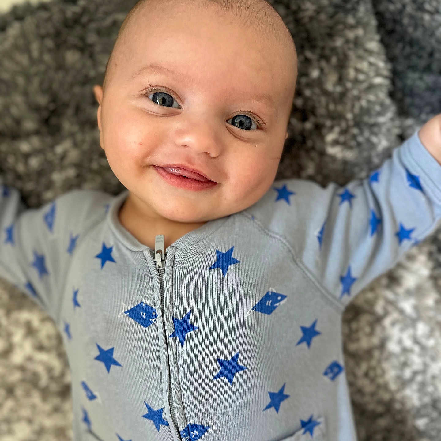 Easton joined the competition — help win amazing prizes! baby, babylaughing, clothing, coat, dimples, face, hair, happy, head, jacket, knitwear, longsleeve, pajamas, person, photography, portrait, selfie, sleeve, smile, t_shirt