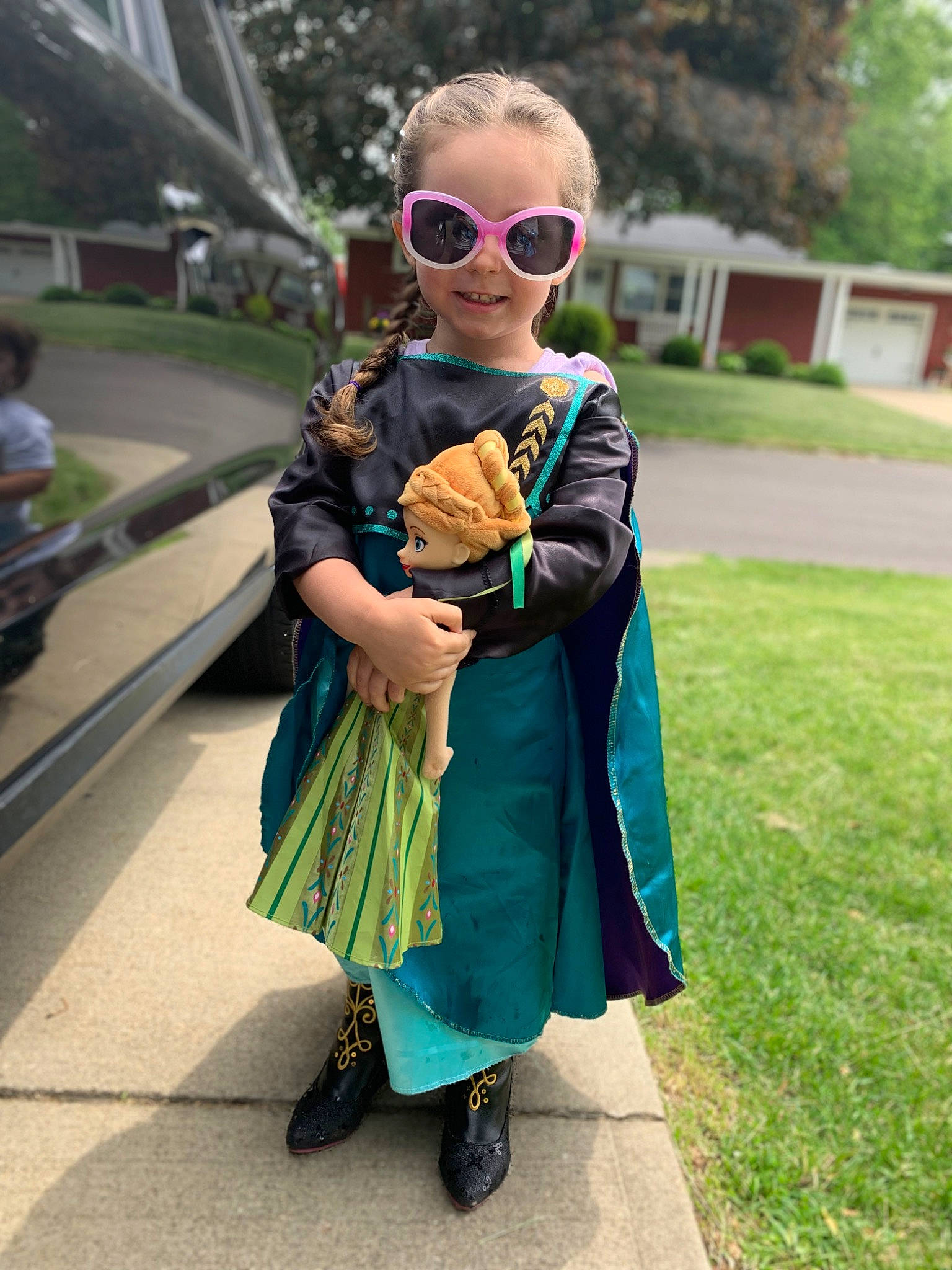 Harper is registered to the contest to win money with this photo: child, cool, electric_blue, eyewear, glasses, goggles, grass, green, hairstyle, happy, headgear, leisure, person, plant, shoe, smile, sunglasses, toddler, toy, tree