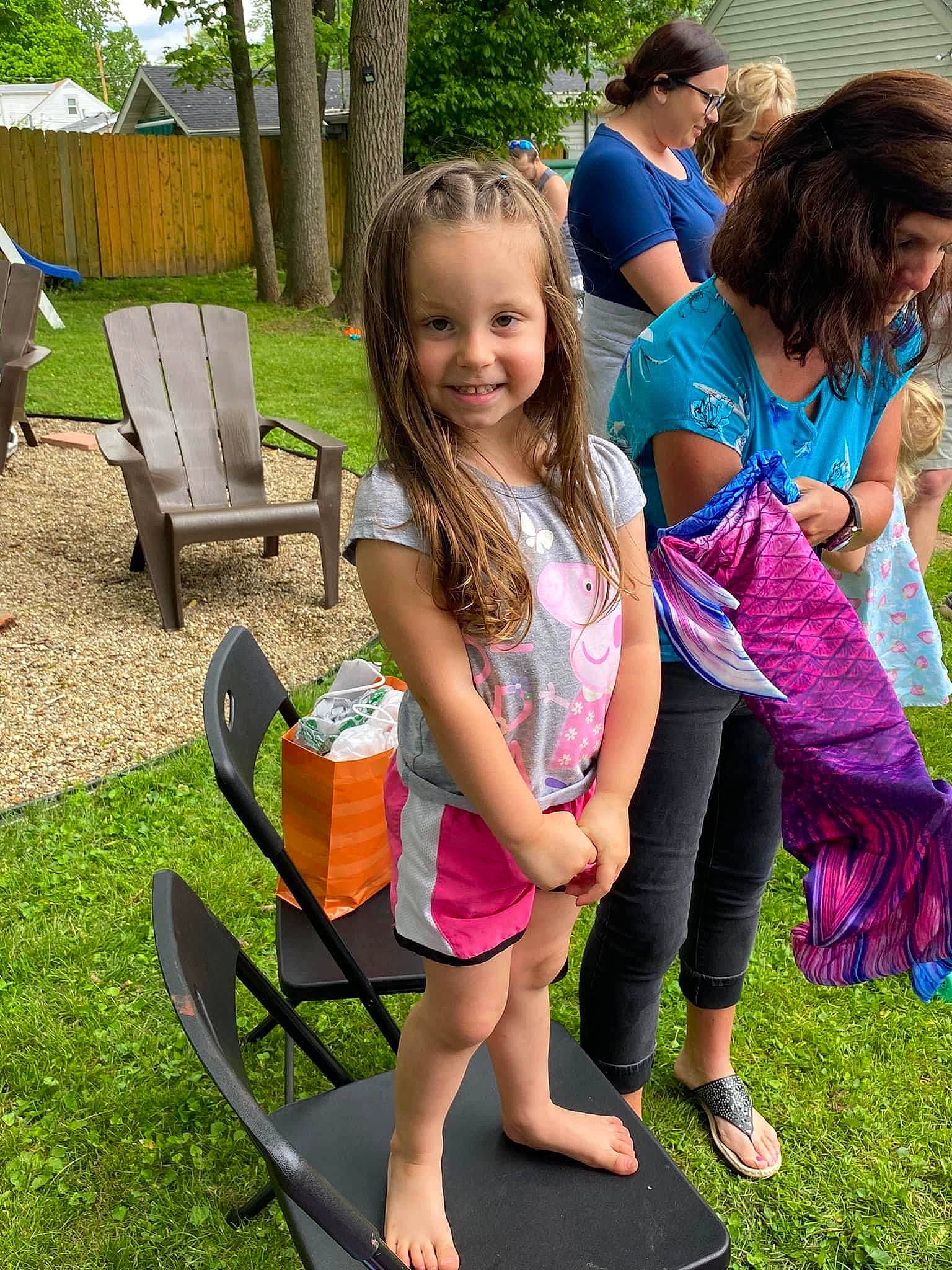 Harper is registered to the contest to win money with this photo: face, fun, grass, grass_family, green, happy, joy, leaf, leisure, nature, outdoor_furniture, people_in_nature, person, photograph, pink, plant, public_space, recreation, smile, summer