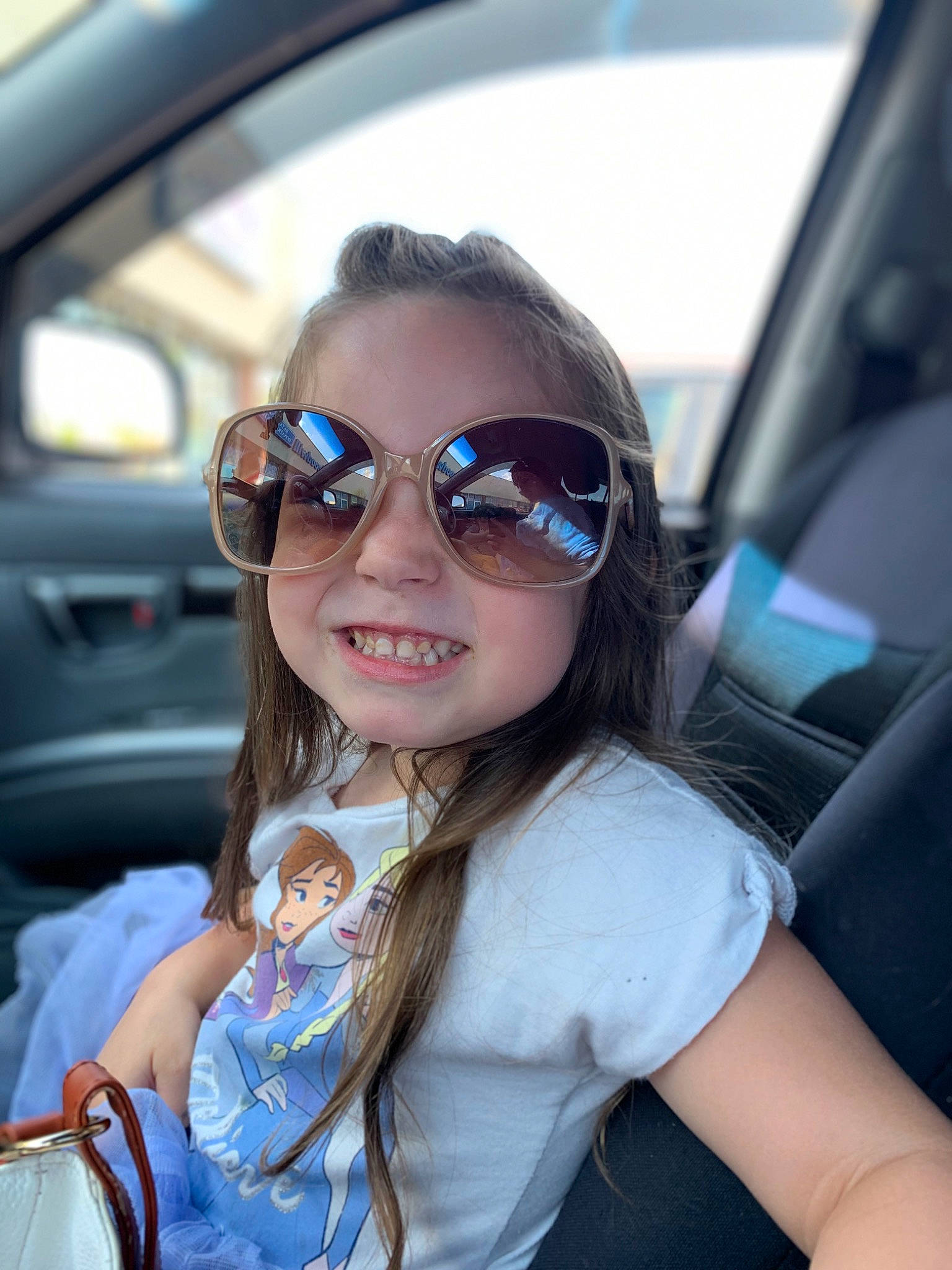 Harper joined the competition — help win amazing prizes! automotive_design, automotive_exterior, automotive_lighting, automotive_mirror, azure, eyewear, face, facial_expression, glasses, goggles, hair, hairstyle, human, joy, lip, mammal, motor_vehicle, person, smile, sunglasses