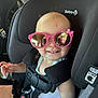 Kinsley is registered to the contest to win money with this photo: accessories, baby, bodypart, car, car_interior, carseat, cushion, face, finger, glasses, goggles, hand, head, homedecor, person, photography, portrait, sunglasses, transportation, vehicle