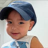 Jasper joined the competition — help win amazing prizes! child, boy, toddler, portrait, smiling, baseball_cap, sleeveless_shirt, puma_logo, indoors, close_up, face, eyes, hair, person, photograph, social_media, phone_screenshot, black_background, casual_clothing, happy