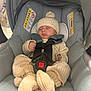Cristian is registered to the contest to win money with this photo: baby, car_seat, sleeping, knitwear, hat, pom_pom, buckle, straps, cozy, infant, child, cute, soft, gray, clothing, bundle, resting, indoors, seat, toddler