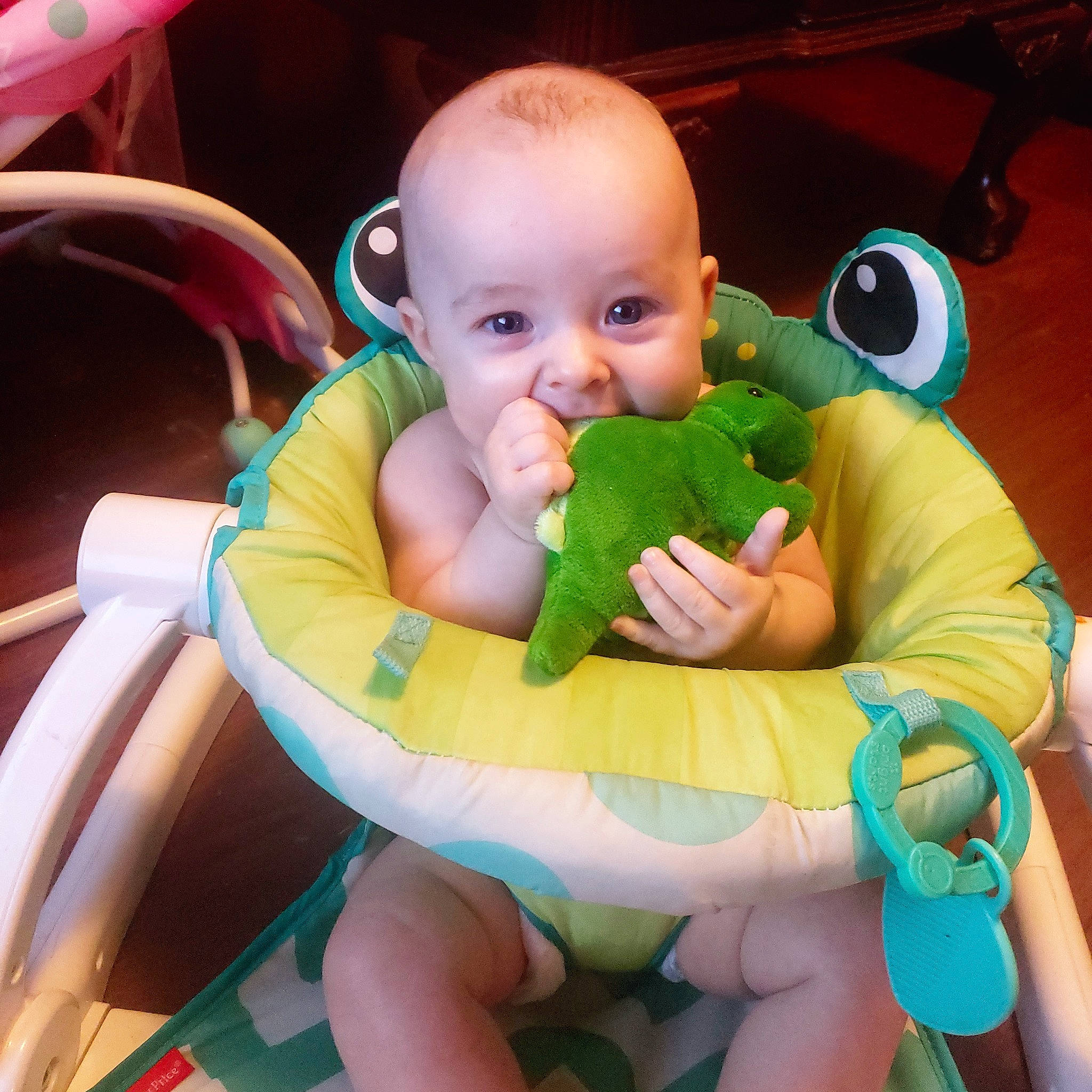 Keith is registered to the contest to win money with this photo: baby, baby_playing_with_toys, baby_products, baby_toddler_clothing, baby_toys, child, eye, lap, person, plastic, plush, product, sock, stuffed_toy, toddler, toy