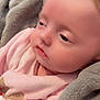 Neïla a rejoint le concours — aidez-le/la à gagner de superbes lots ! baby, blanket, soft_texture, cozy, infant, sleepy, face, closeup, pink_clothing, warm, resting, cute, child, portrait, skin, young, comfort, indoors, peaceful, head