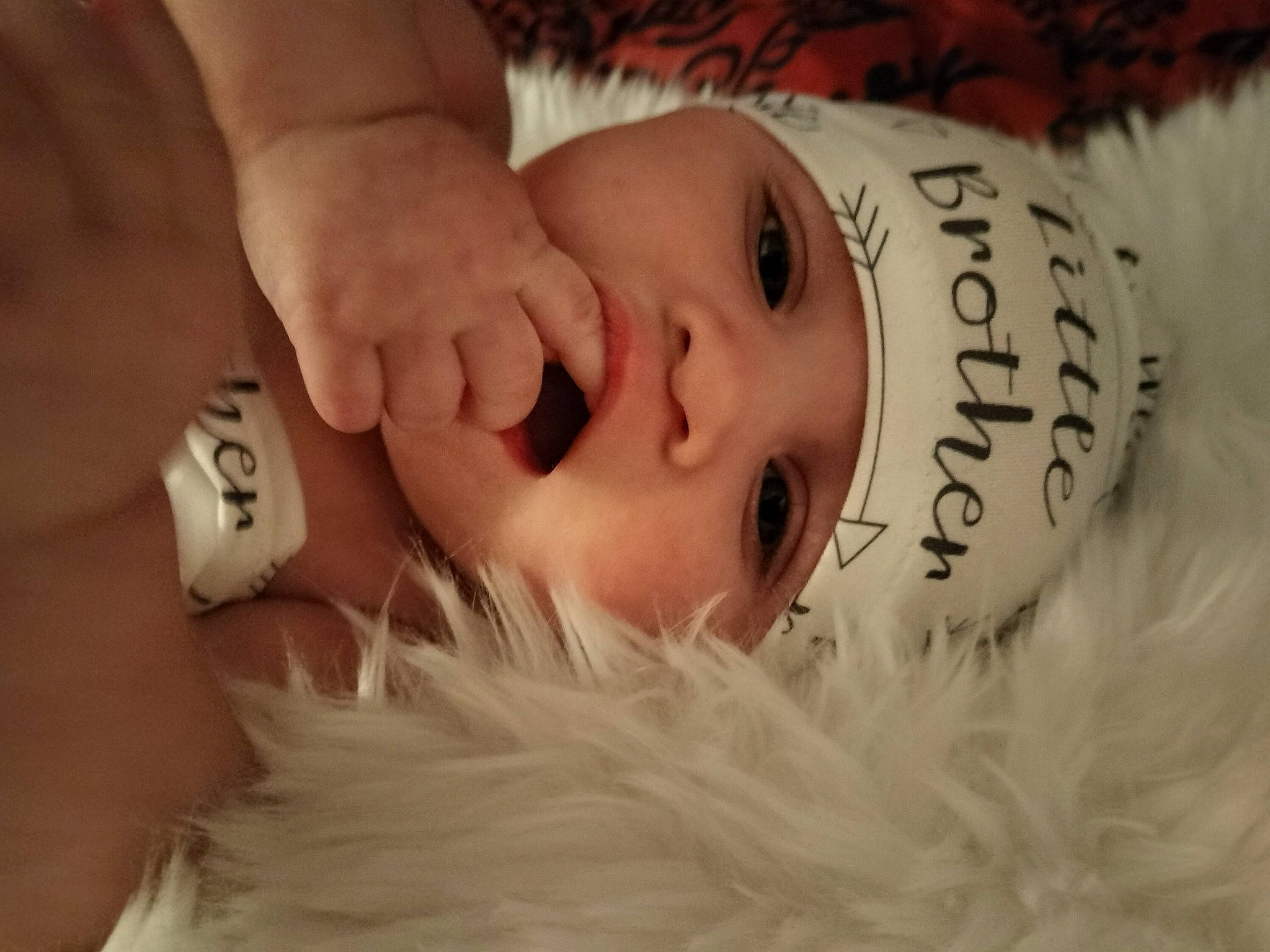 Ryland joined the competition — help win amazing prizes! baby, cheek, comfort, eye, eyebrow, eyelash, gesture, hand, happy, head, headgear, headwear, iris, lip, mammal, nail, nose, person, skin, textile