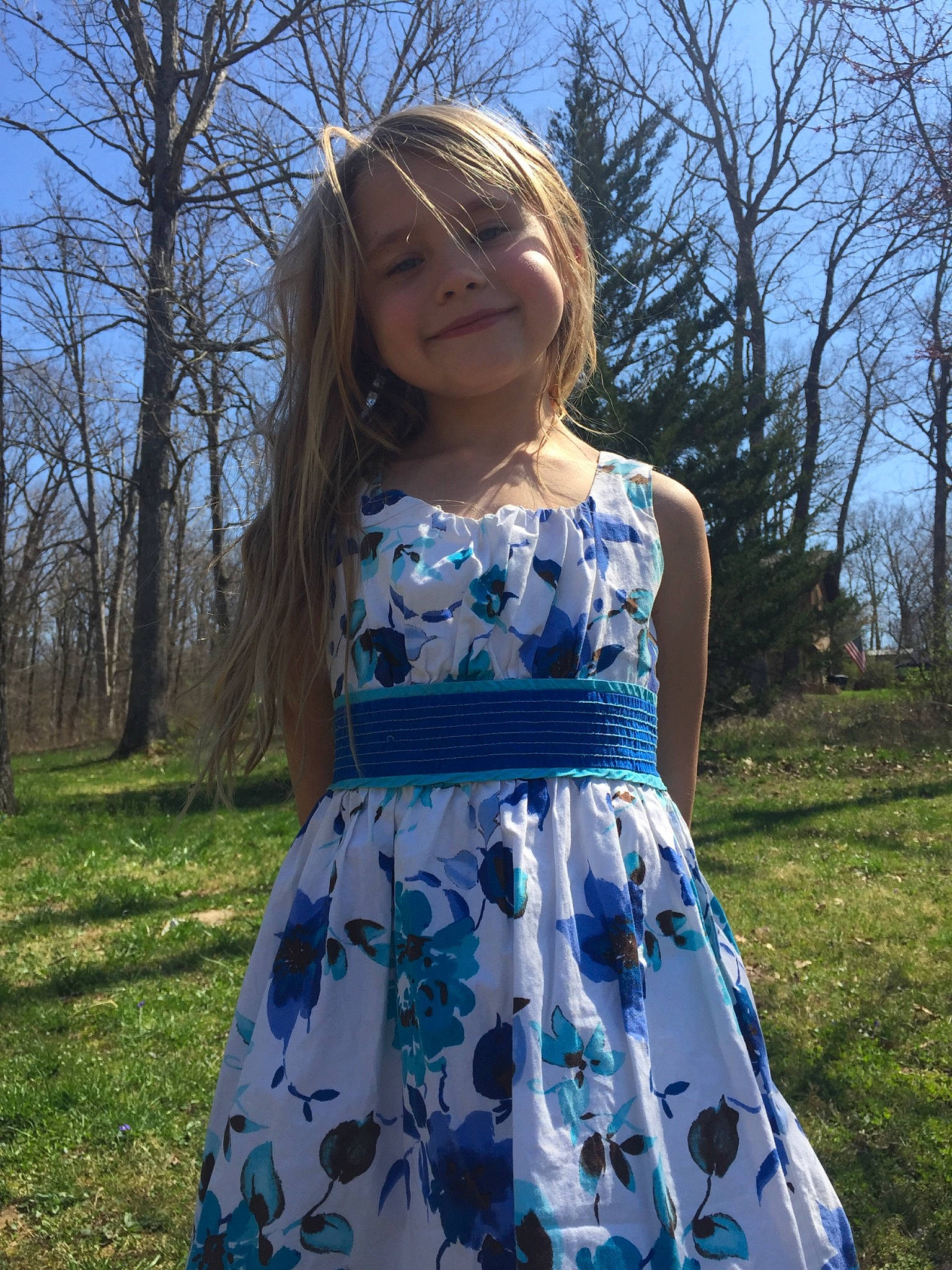 Emmy is registered to the contest to win money with this photo: blue, clothing, cocktail_dress, day_dress, design, dress, electric_blue, grass, joy, pattern, person, plant, tree, wildflower