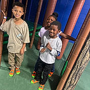 Demarjerey Jr joined the competition — help win amazing prizes! child, children, indoor_play_area, playground, smiling, happy, socks, casual_clothing, padded_poles, climbing_nets, fun, friends, group, boys, girl, play, leisure, colorful, active, posing