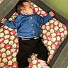 Ivry is registered to the contest to win money with this photo: baby, black_pants, child, closed_eyes, clothing, denim_shirt, face, indoor, infant, lying_down, nursery, owl_pattern, patterned_cushion, pink_socks, playpen, portrait, resting, safe, sleeping, soft_surface