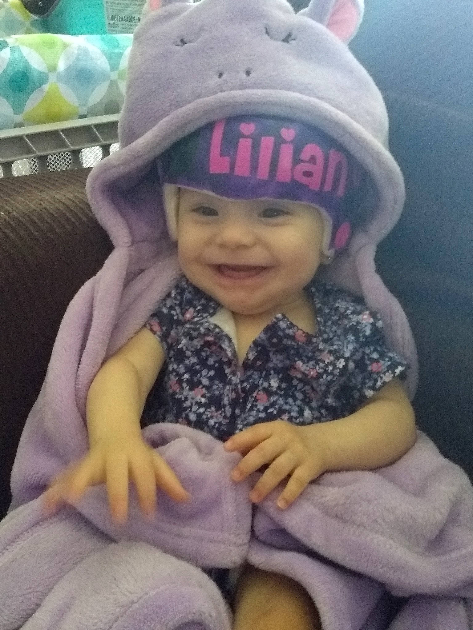 Lilian joined the competition — help win amazing prizes! baby, beanie, bonnet, cap, child, cool, fashion_accessory, fun, happy, hat, head, headgear, joy, knit_cap, person, pink, sitting, skin, smile, toddler
