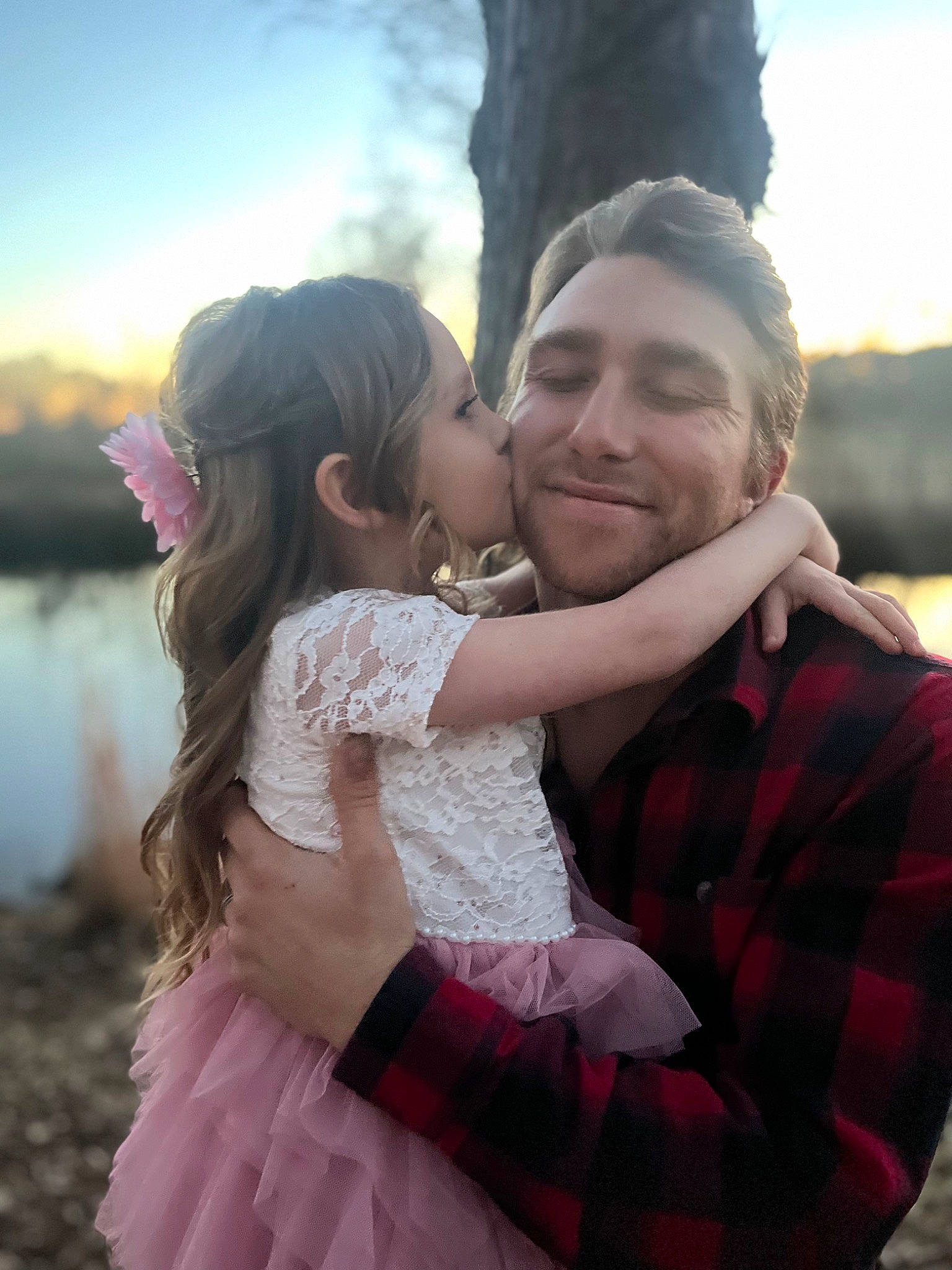 Kendall joined the competition — help win amazing prizes! bridal_clothing, flash_photography, fun, gesture, gown, grass, hairstyle, happy, interaction, joy, kiss, lake, people_in_nature, person, pink, plaid, skin, sky, smile, tartan