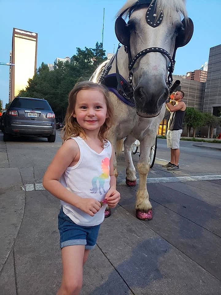 Kendall joined the competition — help win amazing prizes! asphalt, bit, bridle, car, event, fun, happy, horse, horse_supplies, horse_tack, joy, leisure, pack_animal, person, recreation, rein, shorts, sky, smile, toddler