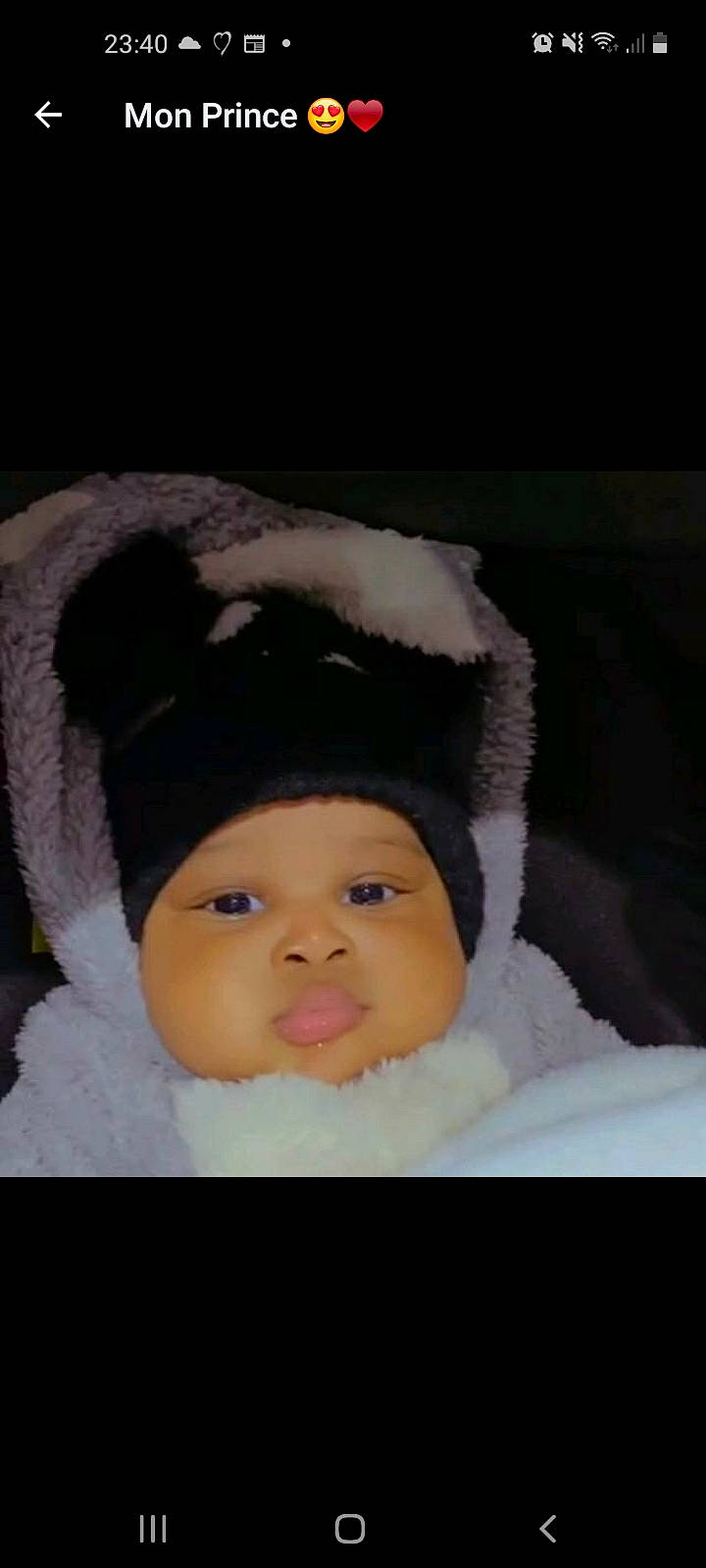 Ryan participe au concours pour gagner de l'argent avec cette photo : baby, baby_toddler_clothing, beanie, cap, cheek, child, event, eyelash, face, flash_photography, freezing, fur, happy, headgear, headwear, knit_cap, lip, nose, person, sleeve