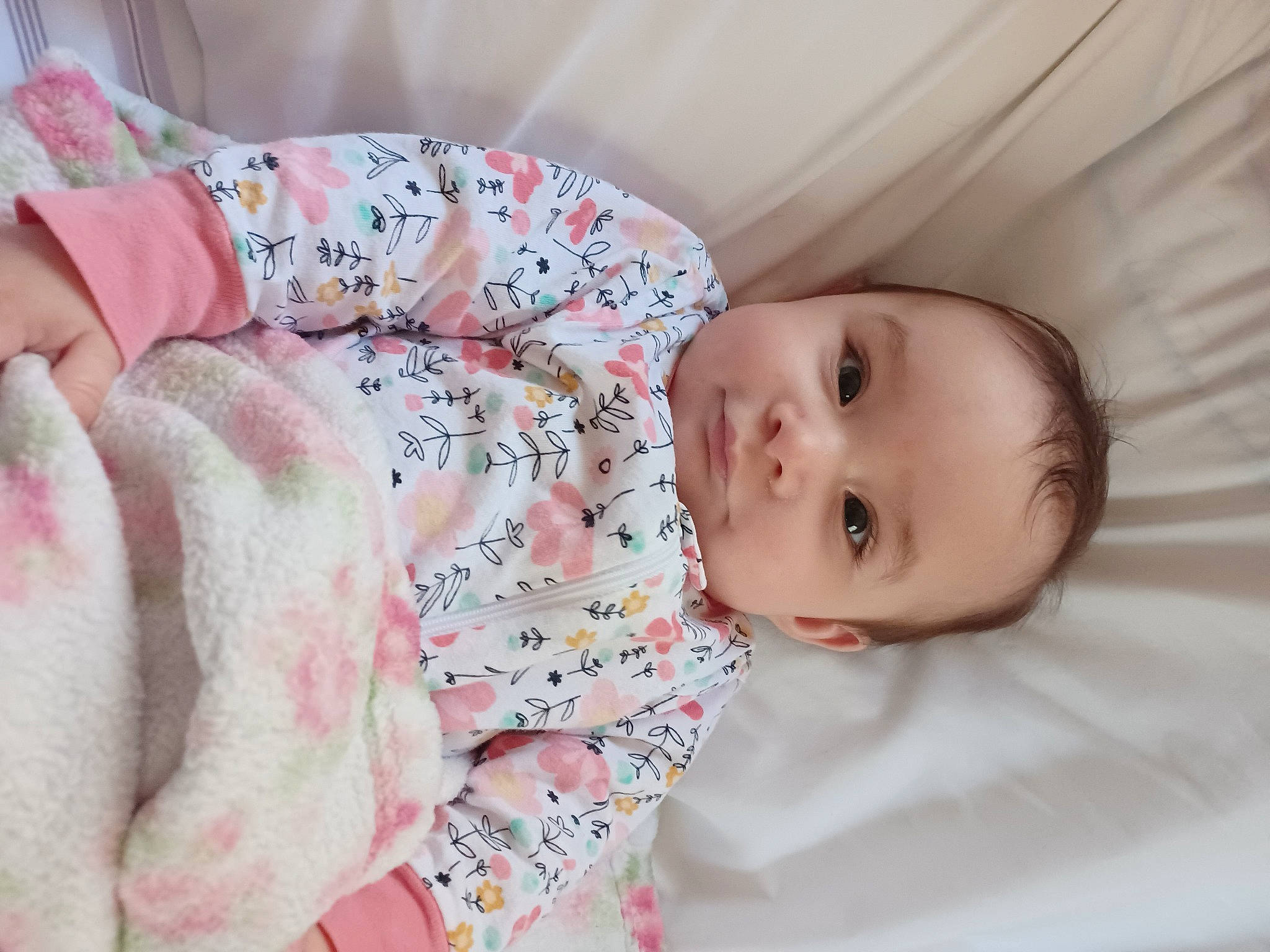 October is registered to the contest to win money with this photo: baby, baby_products, baby_sleeping, baby_toddler_clothing, bedtime, cheek, child, comfort, linens, lip, mammal, mouth, nose, pattern, person, pink, skin, sleeve, textile, toddler