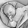 Alyana participe au concours pour gagner de l'argent avec cette photo : baby, sleeping, infant, blanket, cozy, thumb_sucking, face, head, soft_texture, monochrome, portrait, peaceful, child, cute, resting, clothing, cushion, comfort, peace, indoors