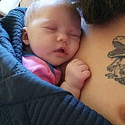 Journey joined the competition — help win amazing prizes! baby, sleeping, infant, blanket, tattoo, adult, closeup, hand, skin, face, cozy, comfort, rest, nap, cuddle, indoor, person, beard, pink_clothing, blue_blanket