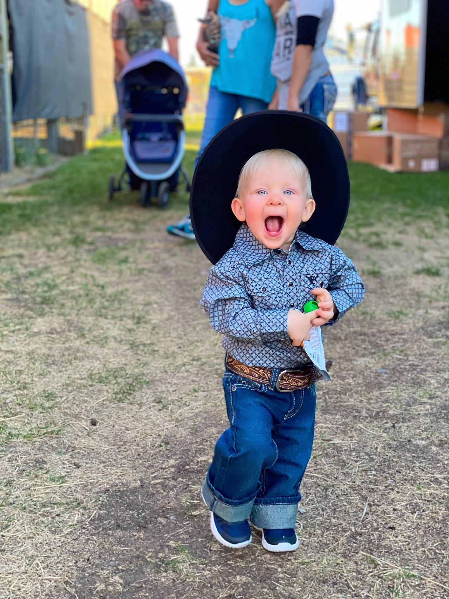 Kooper joined the competition — help win amazing prizes! baby, baby_toddler_clothing, chair, clothing, electric_blue, event, fun, grass, happy, hat, jeans, leisure, person, photograph, recreation, shoe, sleeve, smile, sneakers, t_shirt