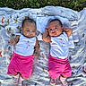 Audrey Dorothea joined the competition — help win amazing prizes! baby, blanket, child, clothing, cute, grass, infant, lying_down, nature, outdoor, patterned_blanket, people, pink_shorts, portrait, relaxed, siblings, striped_socks, summer, two_babies, white_tops