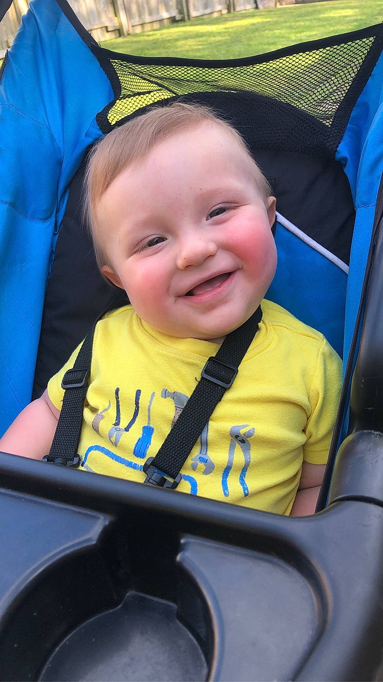 Cannon joined the competition — help win amazing prizes! baby, baby_carriage, black, blue, cheek, chin, cool, eye, facial_expression, hairstyle, happy, head, iris, joy, organ, person, photograph, product, seat_belt, smile