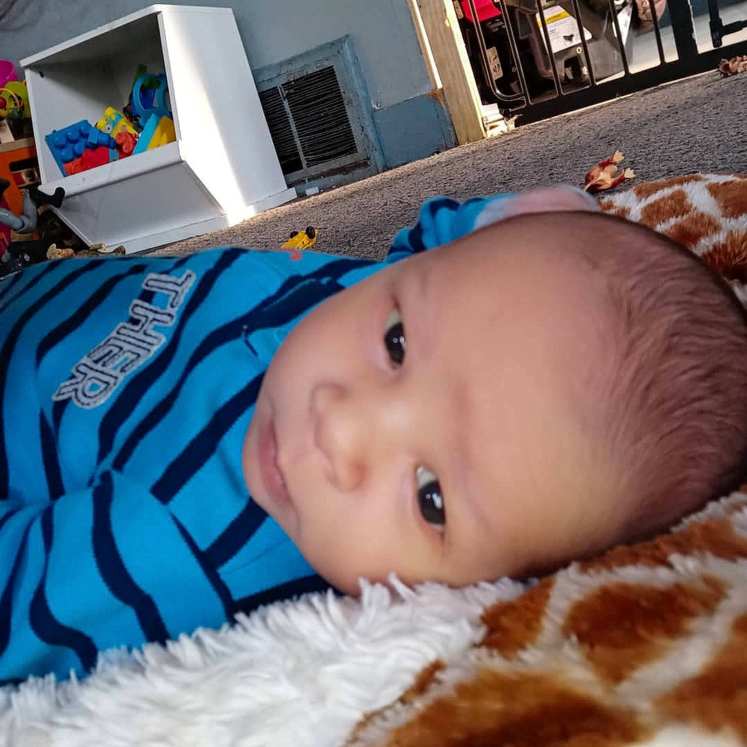 Kyran is registered to the contest to win money with this photo: baby, bedtime, cheek, child, eye, face, head, mouth, person, skin, toddler