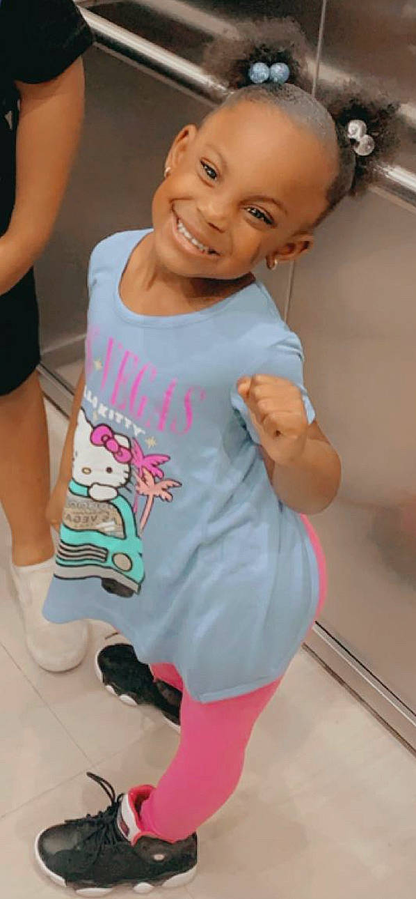 Vaniya Queen is registered to the contest to win money with this photo: baby_toddler_clothing, child, cool, dress, gesture, hair, happy, head, joint, joy, leisure, person, pink, plant, product, skin, sleeve, smile, t_shirt, thigh