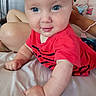 baby, infant, child, blue_eyes, red_shirt, crawling, bed, person, indoor, smile, cheeks, skin, hand, arm, face, clothing, people, young, cute, human